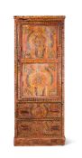 A POLYCHROME DECORATED FREESTANDING WOODEN CUPBOARD,POSSIBLY MOROCCAN