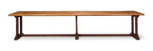 AN OAK TRESTLE TABLE, 19TH CENTURY, POSSIBLY INCORPORATING EARLIER ELEMENTS