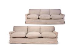 A PAIR OF UPHOLSTERED THREE SEAT SOFAS, MODERN, BY HOWARD CHAIRS LTD