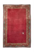 AN ARTS AND CRAFTS STYLE CARPET, POSSIBLY FROM DONEGAL