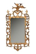 A CARVED GILTWOOD WALL MIRROR, MID 18TH CENTURY