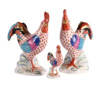 A PAIR OF HEREND ROOSTERS, AND ANOTHER SMALLER EXAMPLE, 20TH CENTURY