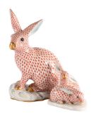A HEREND MODEL OF A RABBIT, AND A SMALLER MODEL OF A PAIR OF RABBITS, SECOND HALF 20TH CENTURY