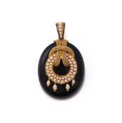 A 19TH CENTURY ONYX AND HALF PEARL LOCKET PENDANT
