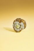 OSCAR HEYMAN & BROTHERS, A COLOURED DIAMOND AND DIAMOND 'PANSY' BROOCH