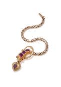 A VICTORIAN GARNET SERPENT BRACELET