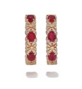 A PAIR OF RUBY AND DIAMOND HOOP EARRINGS