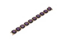 AN AMETHYST, ONYX AND DIAMOND BRACELET