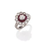 A DIAMOND AND RUBY CLUSTER RING