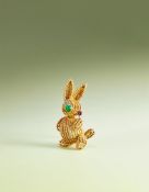 VAN CLEEF & ARPELS, A GEM SET NOVELTY BROOCH