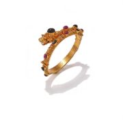 A RUBY AND BLACK STAR SAPPHIRE BANGLE