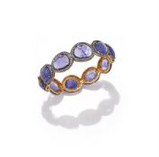 A TANZANITE AND DIAMOND BANGLE