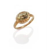 A YELLOW SAPPHIRE SINGLE STONE RING
