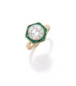 A DIAMOND AND EMERALD RING