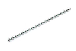AN EMERALD AND DIAMOND BRACELET