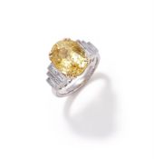 A YELLOW SAPPHIRE AND DIAMOND DRESS RING