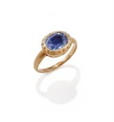 A COLOUR CHANGE SAPPHIRE SINGLE STONE RING