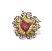AN ENAMEL, RUBY AND DIAMOND FLOWER BROOCH