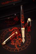 CARAN D'ACHE, YEAR OF THE ROOSTER, A LIMITED EDITION FOUNTAIN AND ROLLERBALL PEN