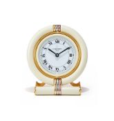 CARTIER, REF. 7522, A TRI-COLOUR GOLD PLATED AND CREAM LACQUER TRAVEL ALARM DESK CLOCK