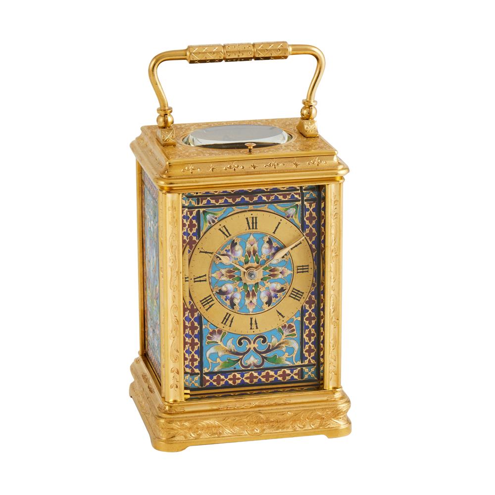 A FINE ENGRAVED GILT BRASS CANNELEE CASED REPEATING CARRIAGE CLOCK WITH CLOISONNE ENAMEL PANELS