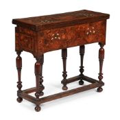 Y AN ANGLO-DUTCH WALNUT AND MARQUETRY FOLDING WRITING TABLE, CIRCA 1700