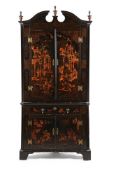 A GEORGE II BLACK LACQUER AND GILT CHINOISERIE STANDING CORNER CUPBOARD, CIRCA 1735