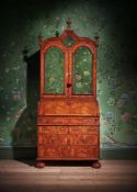 A QUEEN ANNE WALNUT AND FEATHERBANDED BUREAU CABINET, CIRCA 1710
