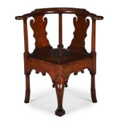 A GEORGE II 'RED WALNUT' CORNER ARMCHAIR, CIRCA 1740