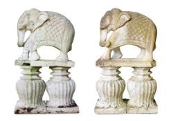A PAIR OF INDIAN WHITE MARBLE MODELS OF ELEPHANTS, LATE 20TH CENTURY
