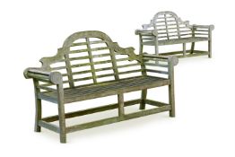 A PAIR OF HARDWOOD GARDEN BENCHES AFTER EDWIN LUTYENS, LATE 20TH CENTURY