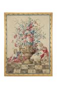 A FRENCH FLORAL URN TAPESTRY, IN THE BEAUVAIS MANNER, EARLY 18TH CENTURY