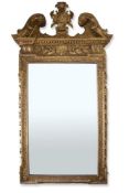 A GEORGE II GILT GESSO MIRROR, CIRCA 1740, IN THE MANNER OF WILLIAM KENT