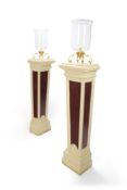 A PAIR OF CREAM PAINTED AND FAUX PORPHYRY TAPERING PEDESTALS OF GEORGE II STYLE, BY PHILIP BOORMAN