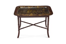A REGENCY PAPIER MACHE AND GILT-JAPANNED TRAY IN THE MANNER OF HENRY CLAY