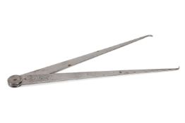 AN OVERSIZED PAIR OF ARCHITECT'S POLISHED STEEL CALIPERS, LATE 19TH CENTURY