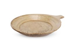 A LARGE SINGLE HANDLED FLAT MARBLE BOWL, 19TH CENTURY