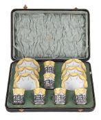 AN EDWARDIAN CASED SILVER MOUNTED COALPORT SIX PIECE COFFEE SET
