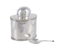 A SILVER OVAL TEA CADDY WITH CADDY SPOON