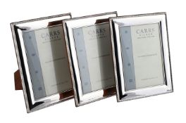 THREE SILVER MOUNTED PHOTO FRAMES
