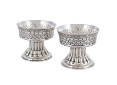 A PAIR OF SILVER SALTS AFTER THE TUDOR HOLMS CUP