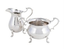 A SILVER BALUSTER CREAM JUG AND SUGAR BOWL