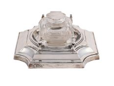 AN EDWARDIAN SILVER SHAPED SQUARE INKSTAND