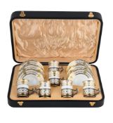 A CASED SILVER MOUNTED SIX PIECE BONE CHINA COFFEE SET