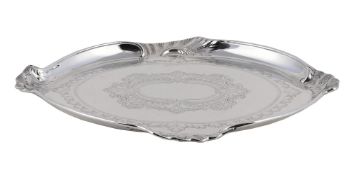 AN EDWARDIAN SILVER SHAPED OVAL TRAY