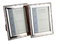 TWO SILVER MOUNTED PHOTO FRAMES