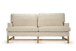 A 'FALCONER' SOFA BY SIBYL COLEFAX & JOHN FOWLER