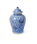 A CHINESE BLUE AND WHITE VASE AND COVER TRANSITIONAL PERIOD