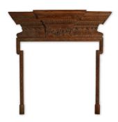 A GEORGE II CARVED PINE FIRE SURROUND, CIRCA 1740