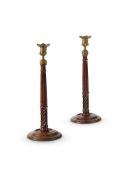 A PAIR OF GEORGE III BRASS MOUNTED MAHOGANY CANDLESTICKS, CIRCA 1770